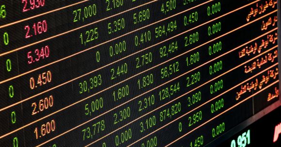 Stock Market: Trading Securities. - Numbers on Monitor